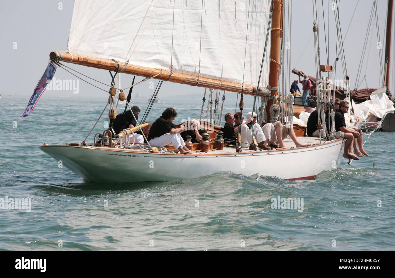 'Kelpie', gaff cutter, Solent 38 foot class, designer Alfred Mylne, built 1904.  Waiting for a breeze to race in the Yarmouth Old Gaffers' Festival Stock Photo