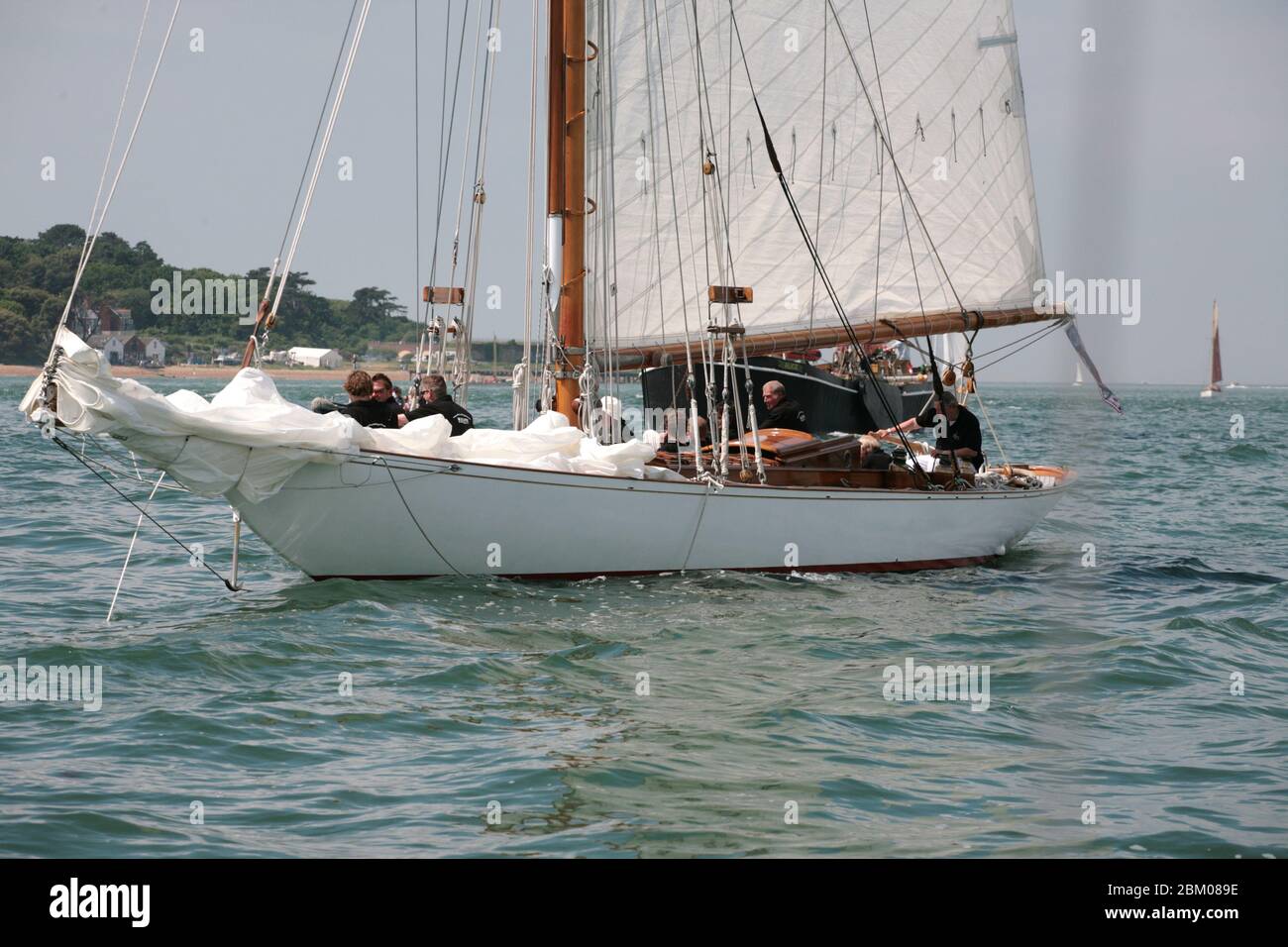 'Kelpie', gaff cutter, Solent 38 foot class, designer Alfred Mylne, built 1904.  Waiting for a breeze to race in the Yarmouth Old Gaffers' Festival Stock Photo