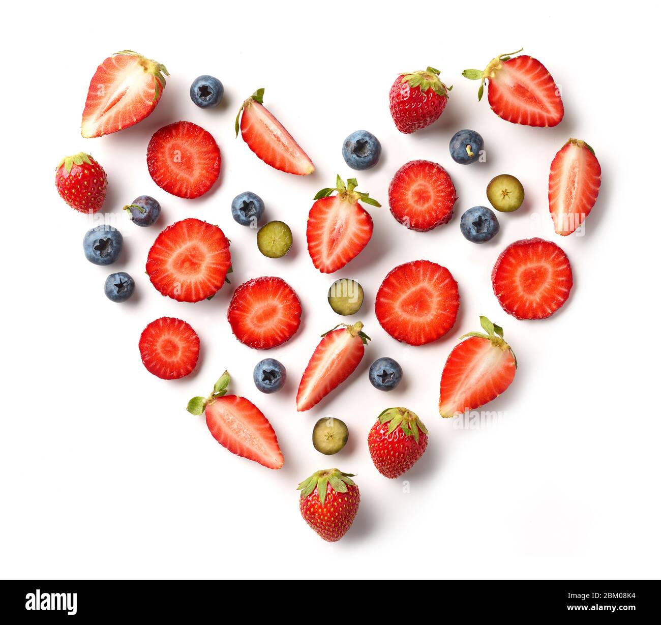 heart shaped fruits isolated on white background, top view Stock Photo