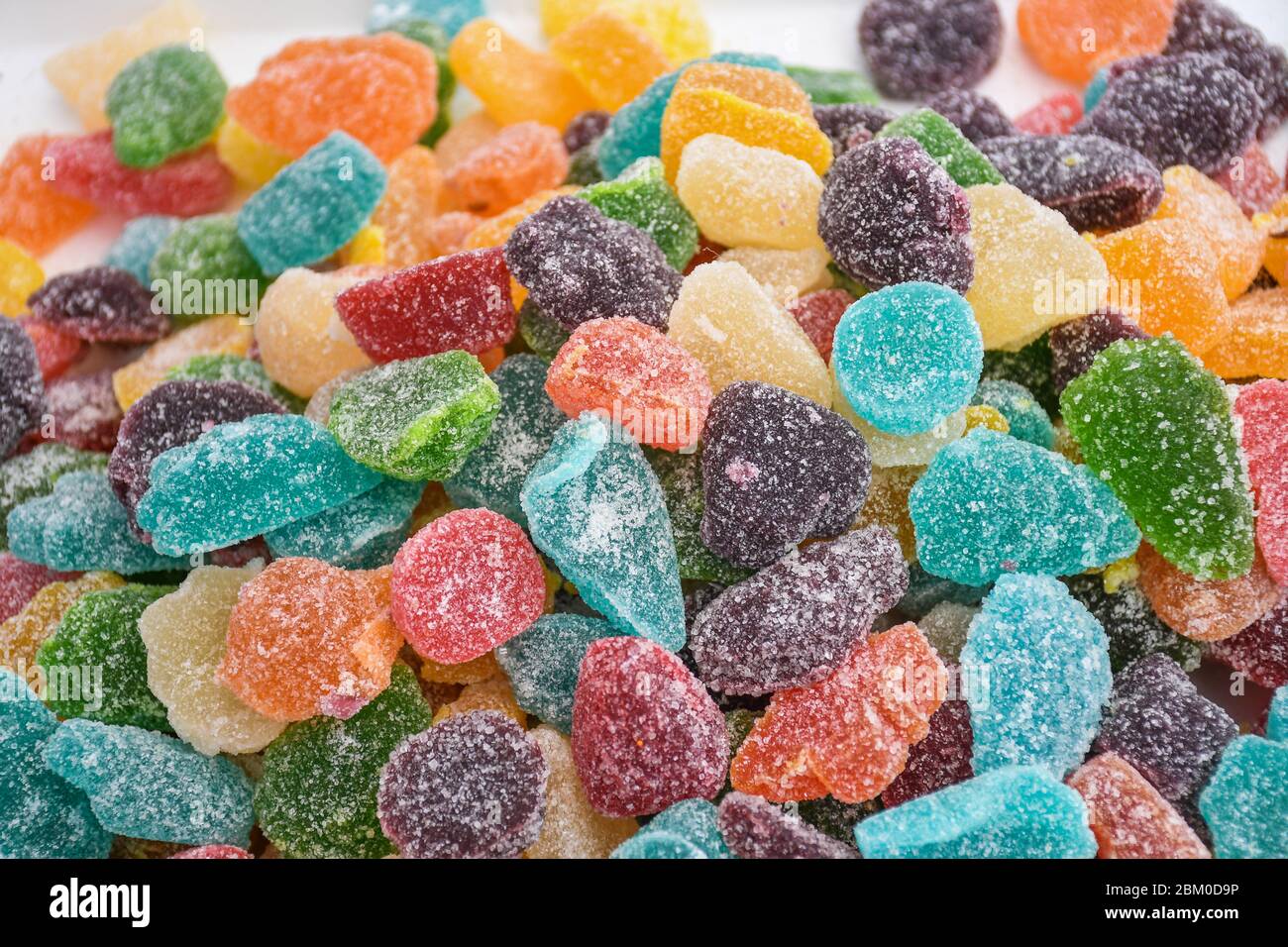 Gumdrops jelly beans candies in the form of raspberries and ...