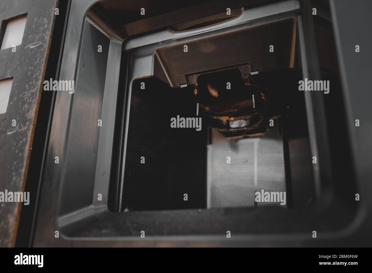 Dirty coffee machine close up look. Barista equipment. Coffee maker