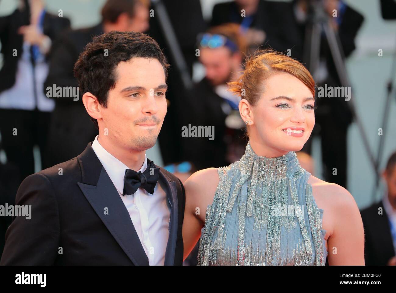 VENICE, ITALY - AUGUST 31: Emma Stone and Damien Chazelle attends the premiere of 'La La Land' during the 73rd Venice Film Festival Stock Photo