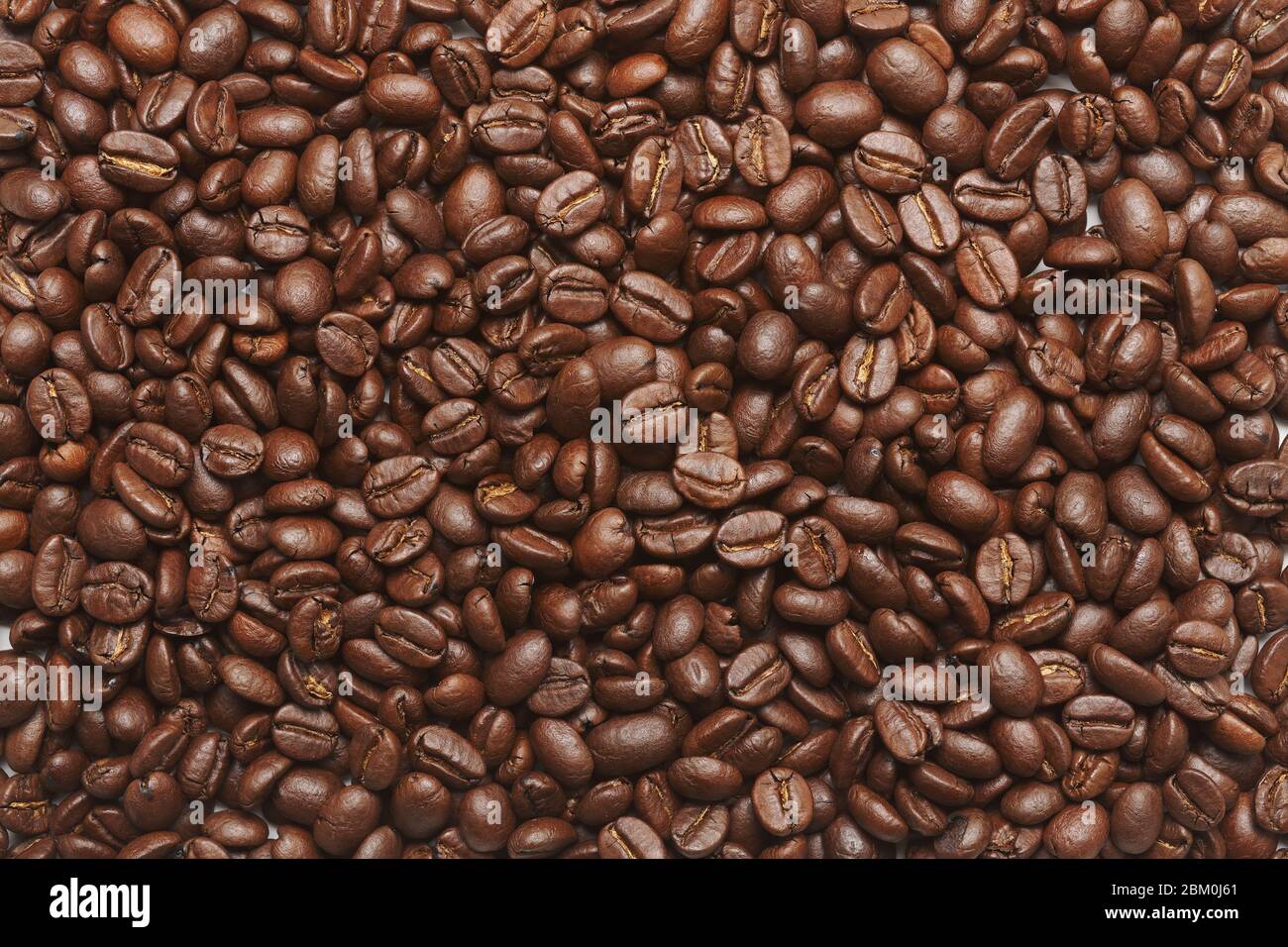 Full background of freshly ground coffee expresso beans Stock Photo Alamy