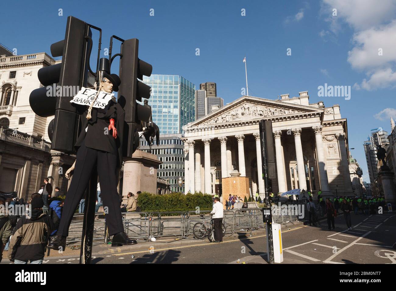 Anti G20 protests, an effigy of a banker hanging in front of Bank of England (left) and the Royal Exchange (center), City of London, UK.  1 Apr 2009 Stock Photo
