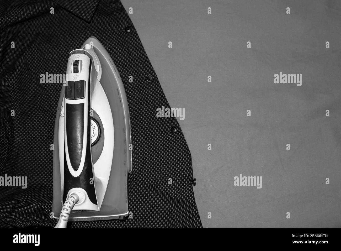 Ironing clothes Black and White Stock Photos & Images Alamy