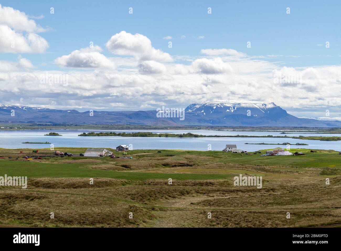 Stunning view looking SE across part of Lake Mývatn, Iceland towards Bláfjall, a Pleistocene table mountain. Stock Photo