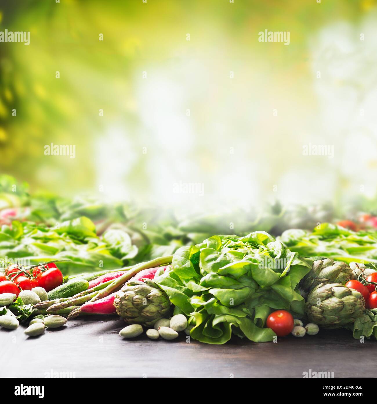 Organic farm vegetables background at sunny summer garden green nature  background. Eco veggies . Healthy clean food concept. Tomato, lettuce, root  v Stock Photo - Alamy