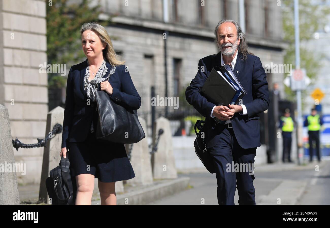 John Waters (right) and Gemma O'Doherty arrive at the High Court in Dublin, where they are seeking to have various pieces of recently enacted legislation, introduced due to the Covid-19 pandemic, quashed by a judge. Stock Photo