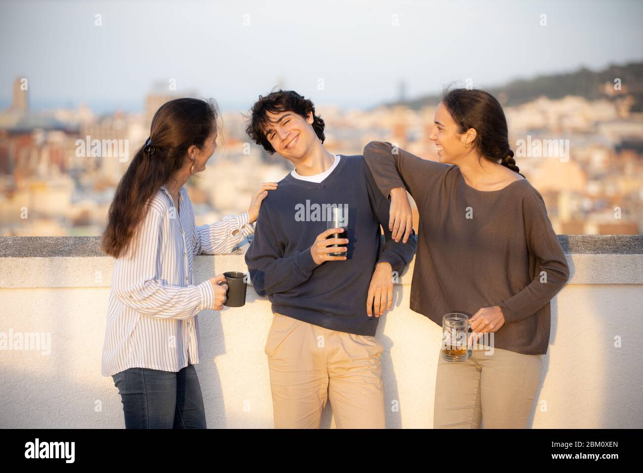 Three young people enjoying outdoors Stock Photo