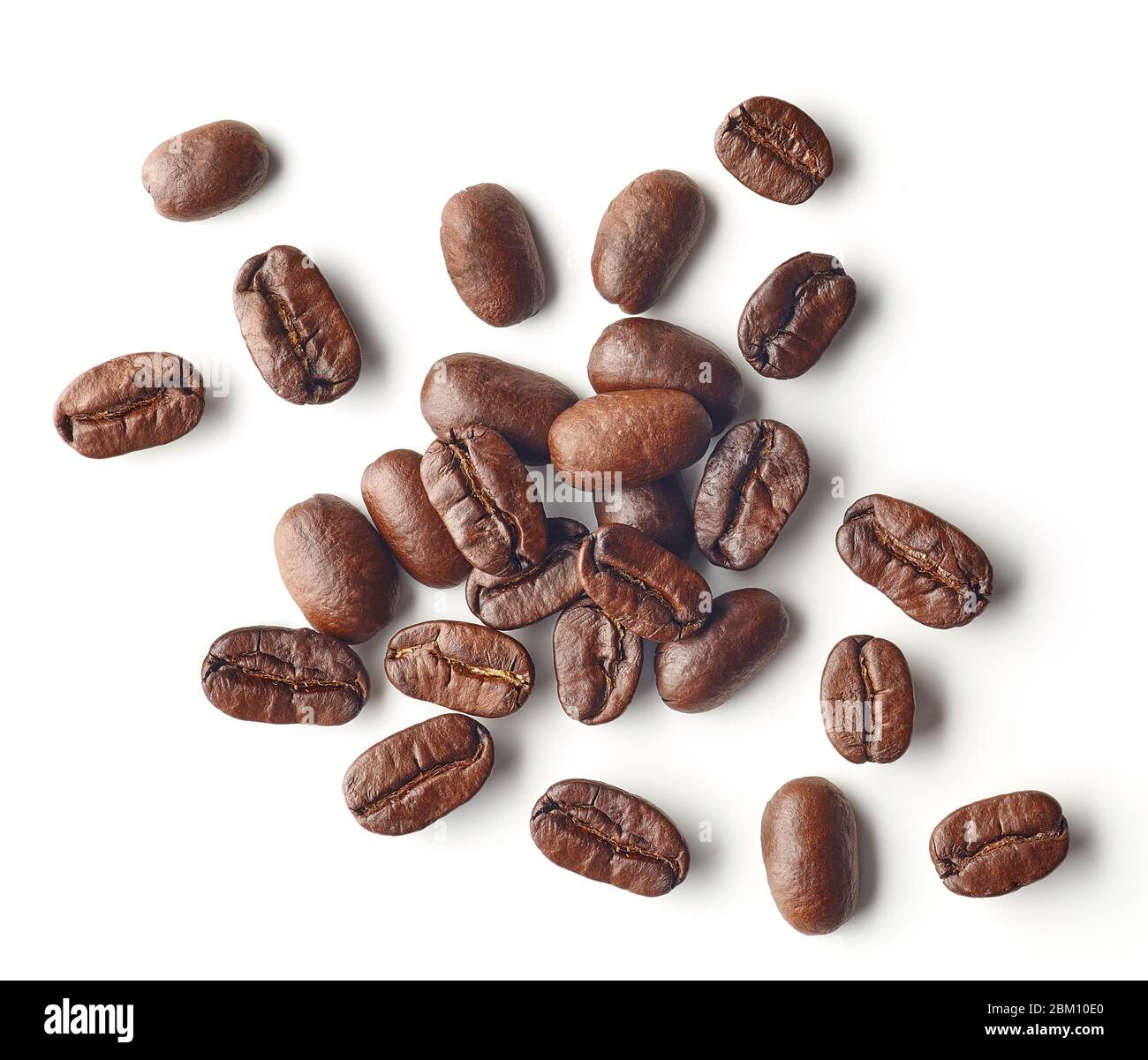 Heap of roasted coffee beans isolated on white background, top view ...