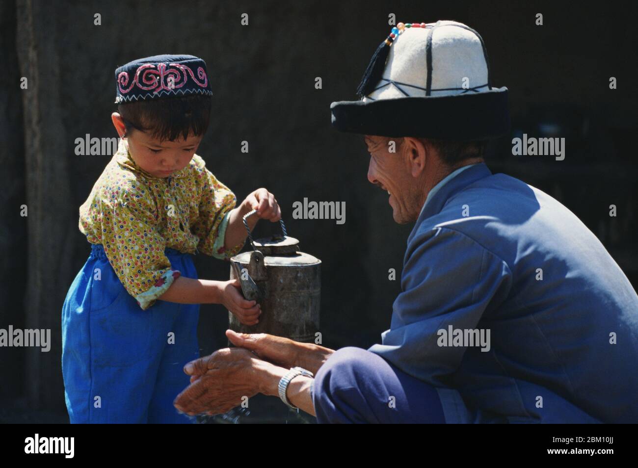 In June 2001 herders washed their hands before meals in the pastoral area of ??Xinyuan County Xinjiang Yili Kazakh Autonomous Prefecture Stock Photo