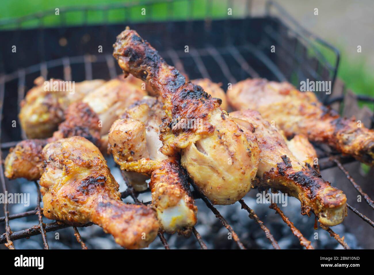 grilled chicken legs, drumstick. charcoal meat closeup Stock Photo Alamy