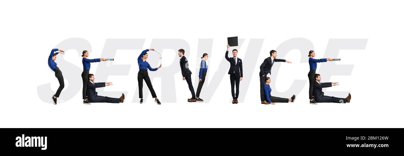 Group of people forming service word at studio Stock Photo - Alamy