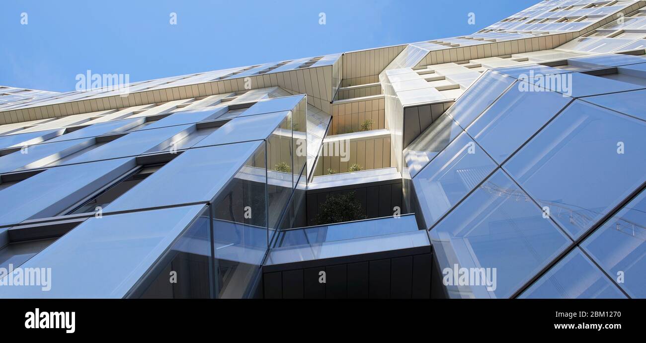 Exterior facade viewed from below. Circus West Village - Battersea Power Station, London, United Kingdom. Architect: simpsonhaugh, 2018. Stock Photo