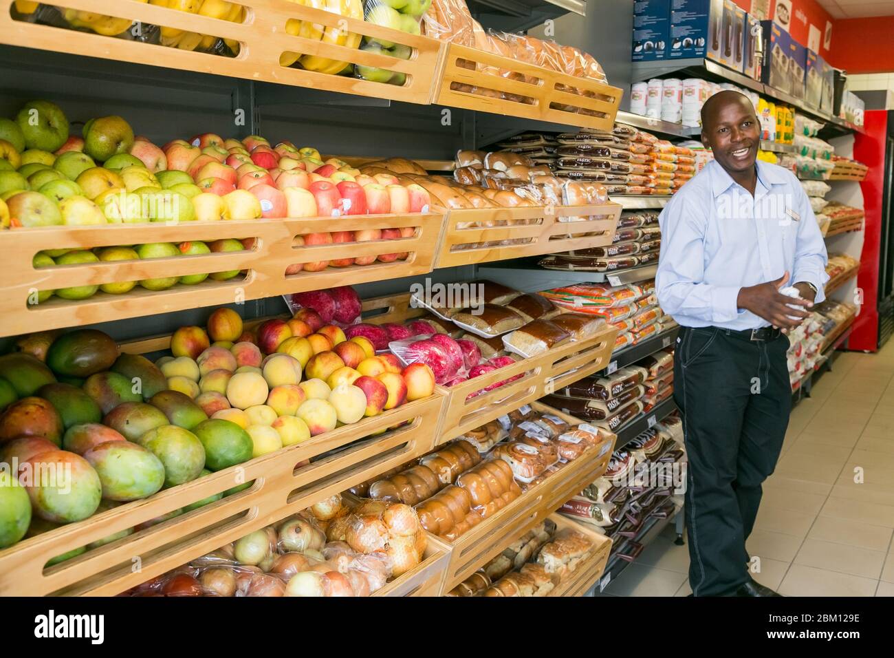 Johannesburg, South Africa February 24, 2016 Grocery store staff packing shelves at local