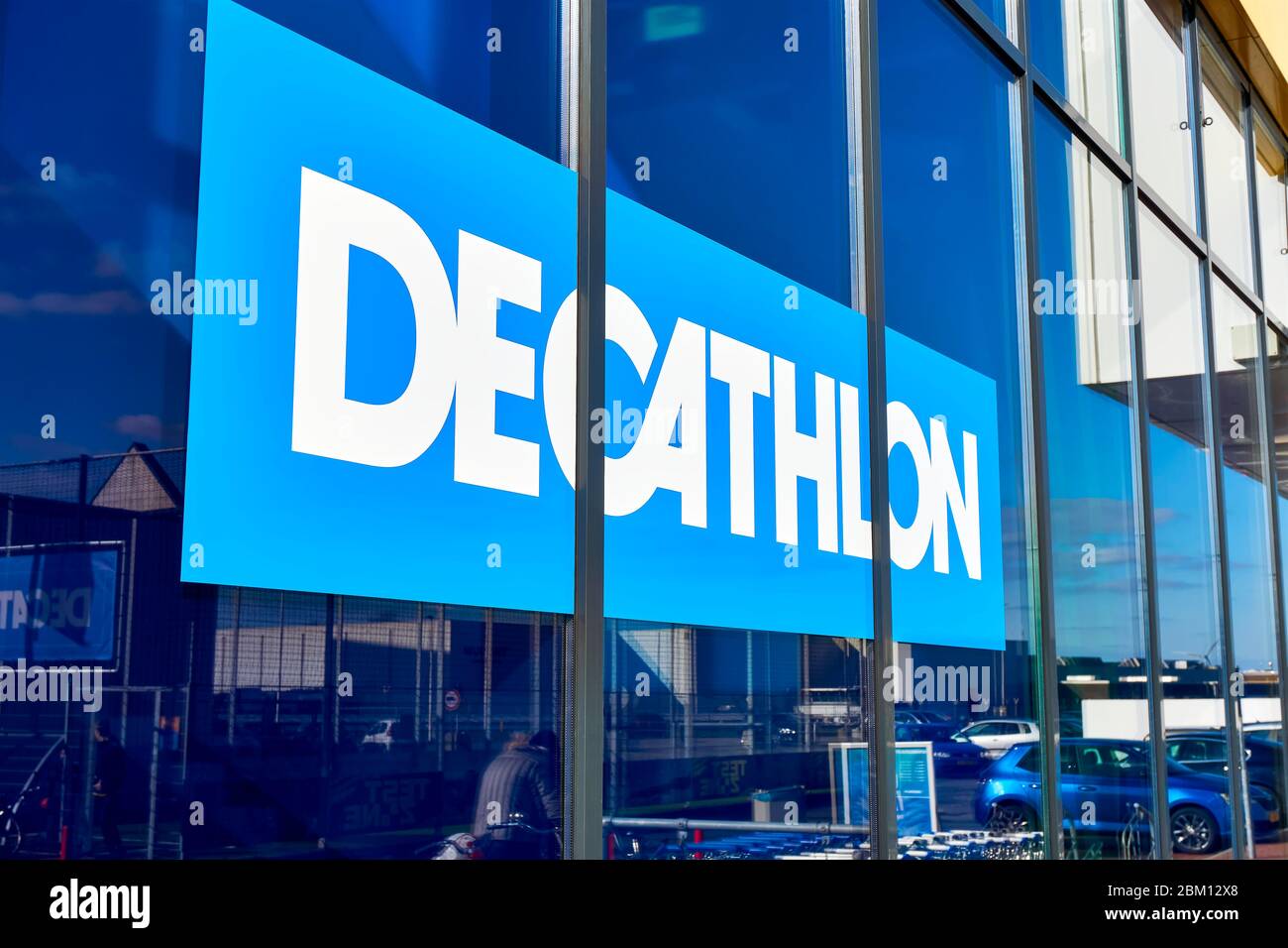 Leeuwarden, The Netherlands March 21, 2020 - Decathlon sign on a store wall. Decathlon is a French company and a large sporting goods retailer. Stock Photo