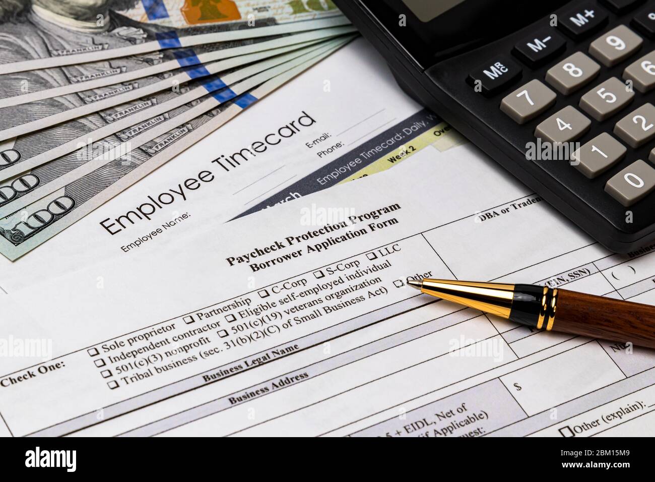 Paycheck protection program application for small business payroll support from federal government stimulus bill during Covid-19 coronavirus pandemic Stock Photo