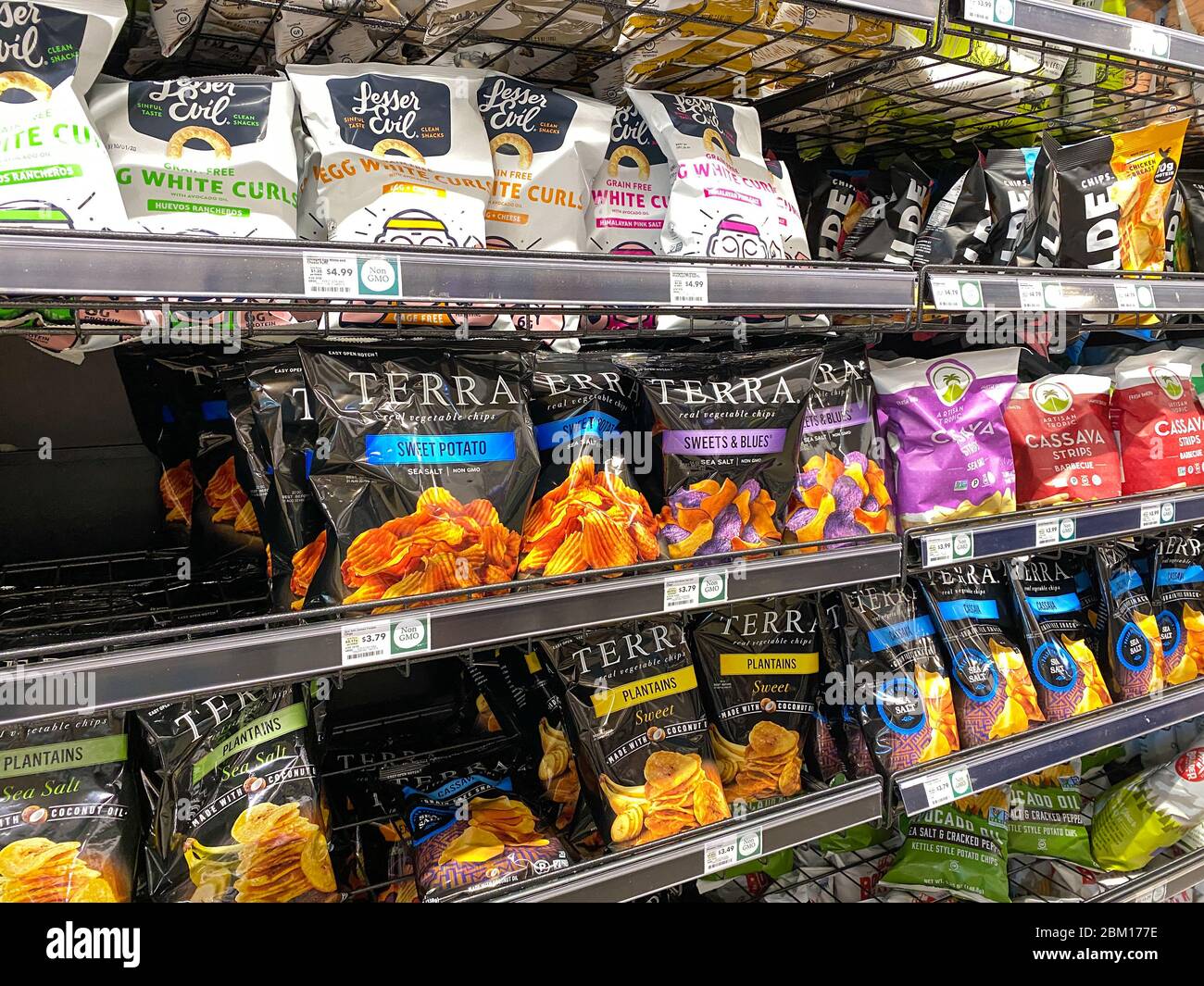 Orlando,FL/USA-5/3/20: A display of Potato, Plantain, and Cassava Chips at a Whole Foods Market Grocery Store. Stock Photo