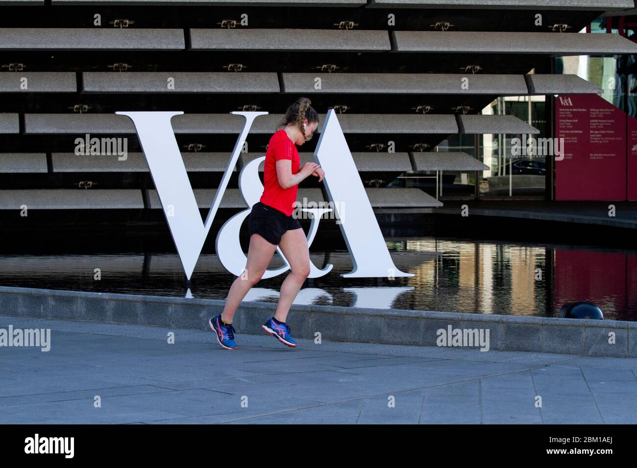 Runner with both feet off ground hires stock photography and images