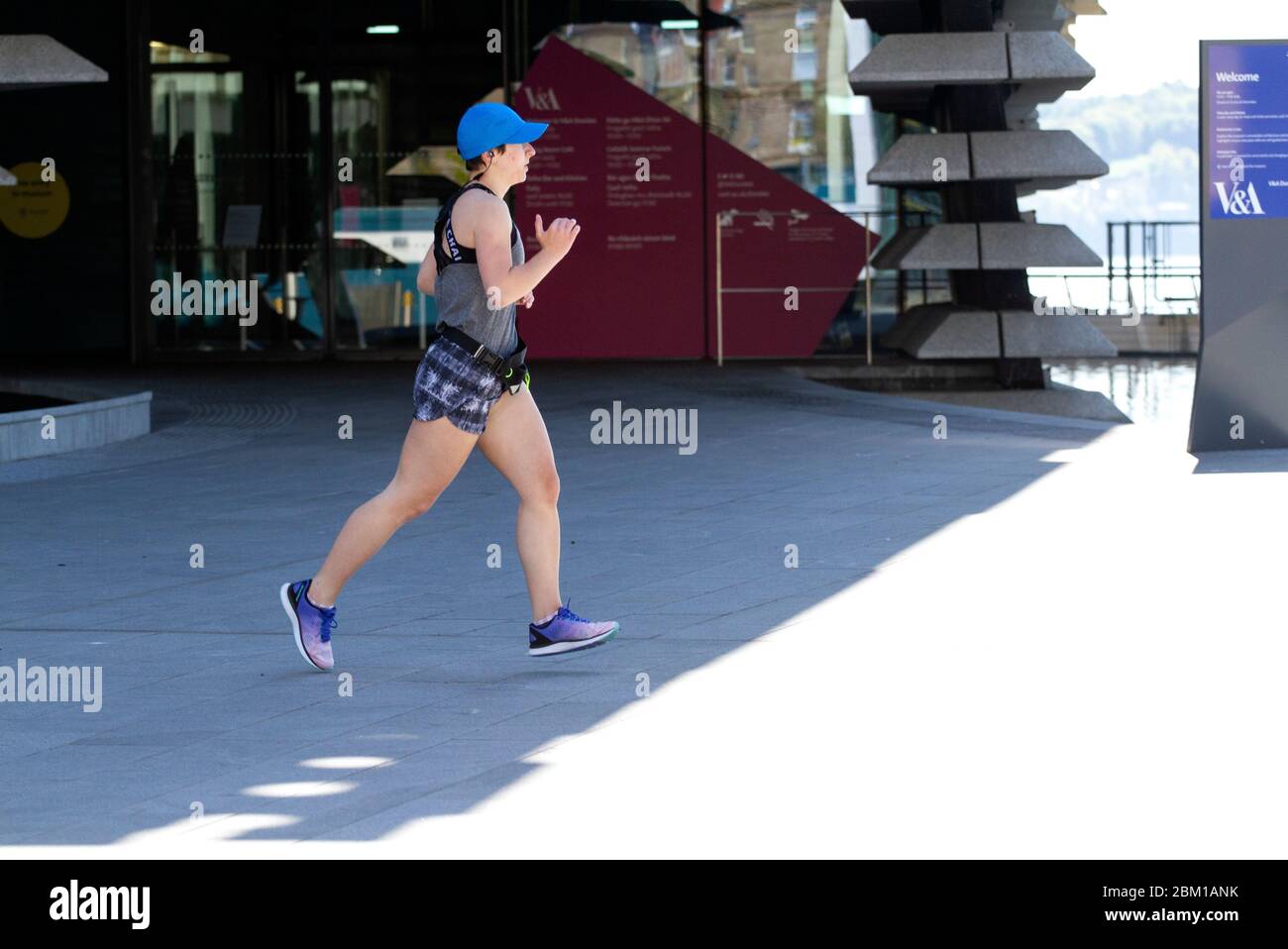 Runner with both feet off ground hires stock photography and images
