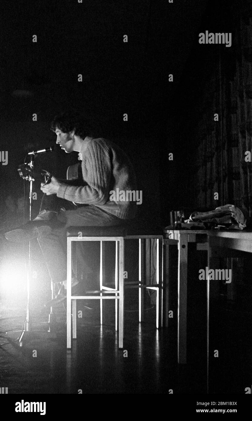 Folk musician Bert Jansch performs solo at Bristol University’s Student Union in May 1969.  Acclaimed as a leading figure in the British Folk Revival in the sixties, the previous year he had co-founded the popular folk group Pentangle, whose album Basket of Light reached Number 5 in the UK album charts later in 1969. Stock Photo