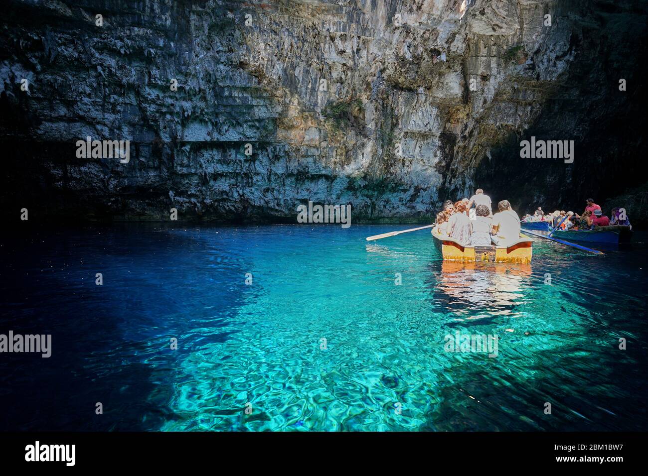 Boats in Melissani Cave / Lake in Kefalonia Island (Cephalonia), Ionian Sea, Greece Stock Photo