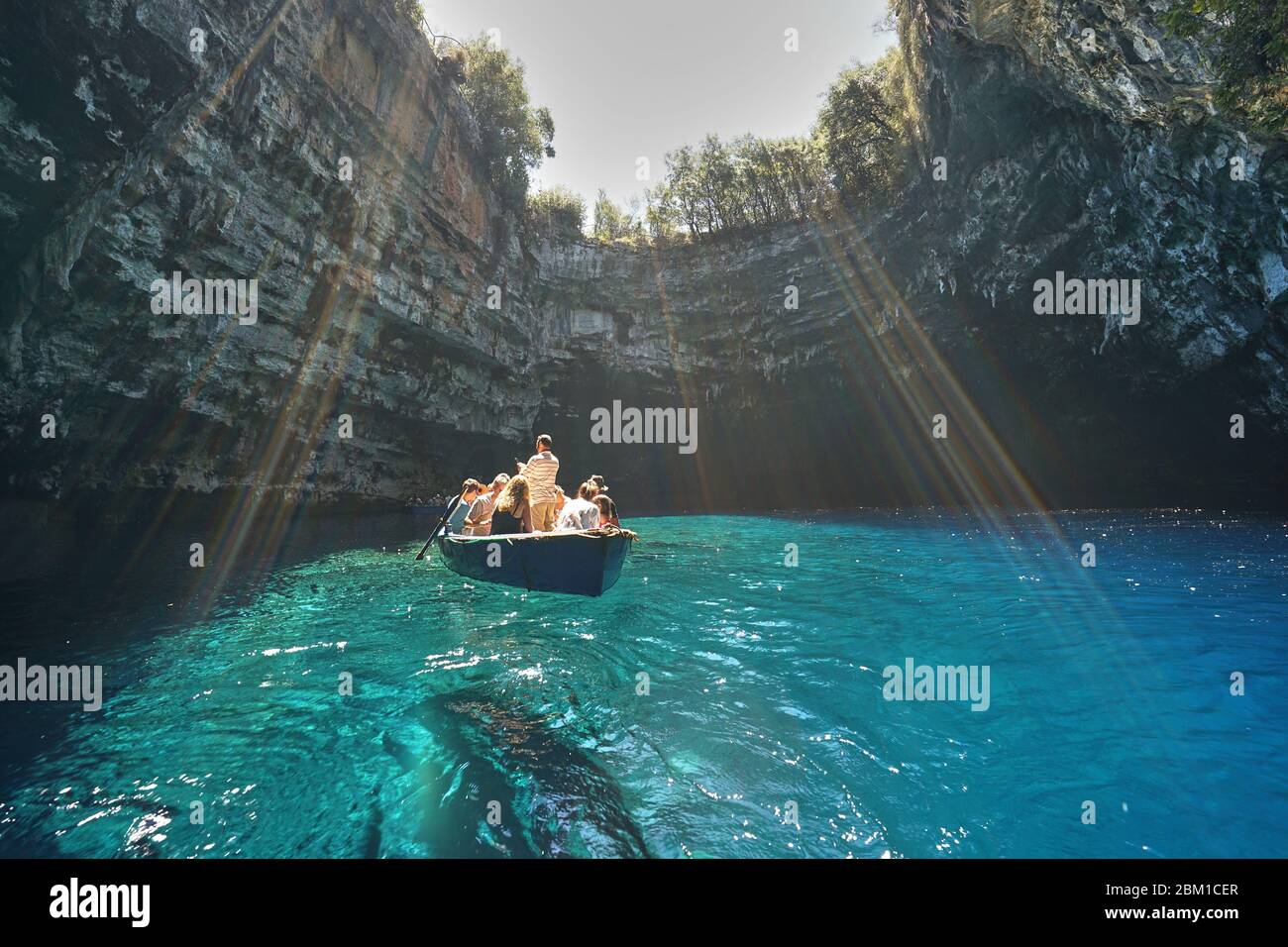 Boats in Melissani Cave / Lake in Kefalonia Island (Cephalonia), Ionian Sea, Greece Stock Photo
