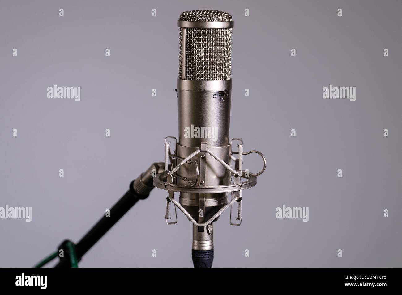 large diaphragm condenser microphone in shock mount Stock Photo