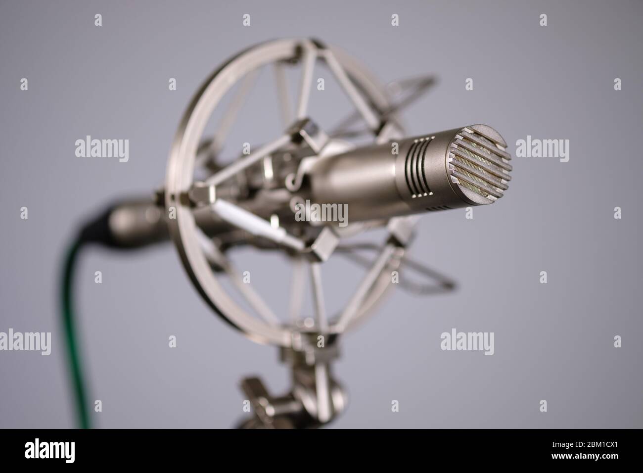 Small diaphragm condenser microphone in shock mount Stock Photo Alamy