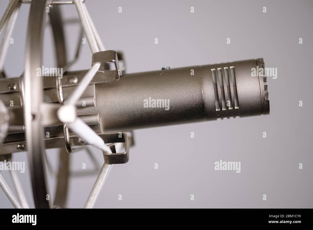 Small diaphragm condenser microphone in shock mount Stock Photo Alamy