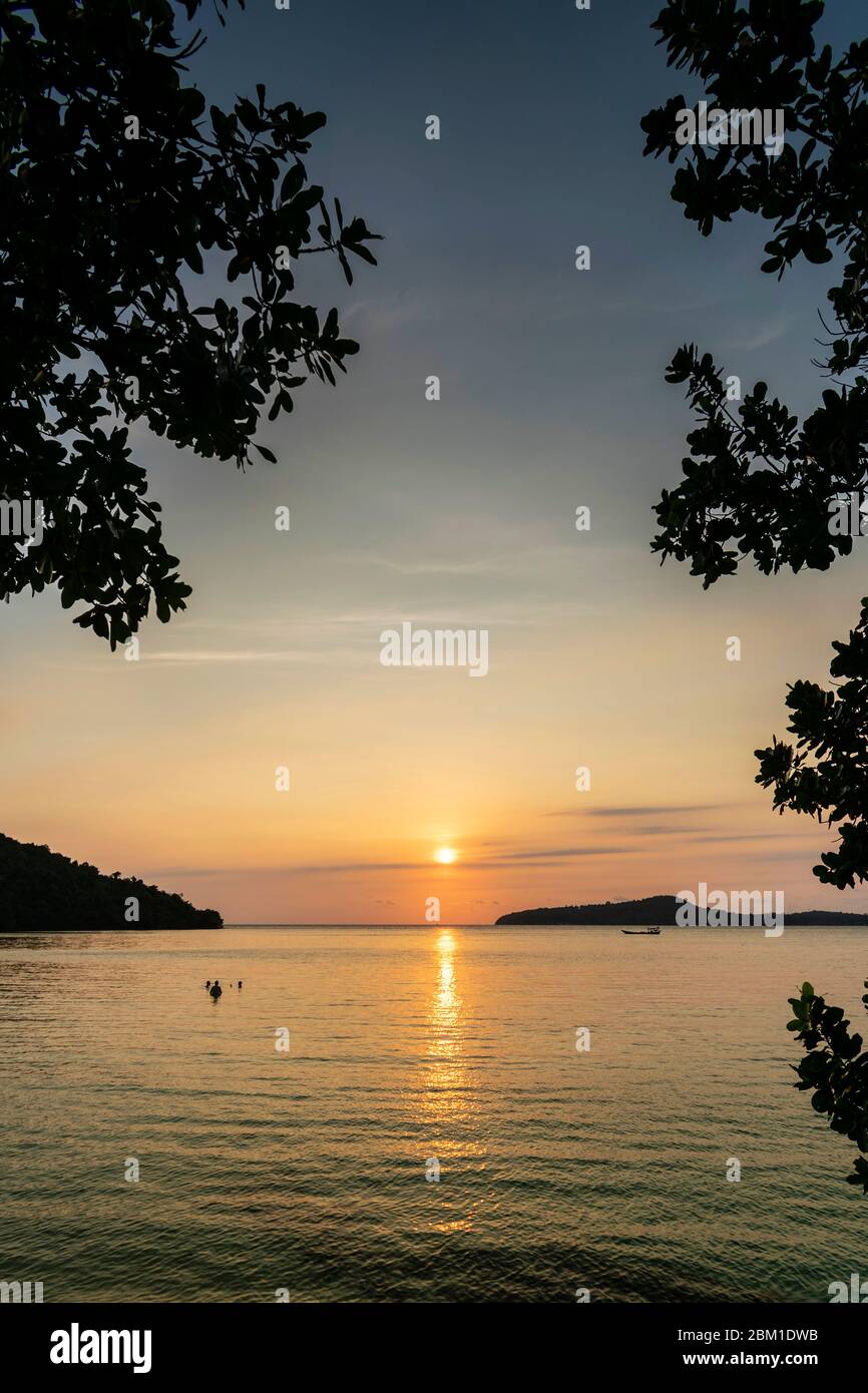 view from Koh Ta Kiev island  towards Koh Russei near Sihanoukville in Cambodia at sunset Stock Photo