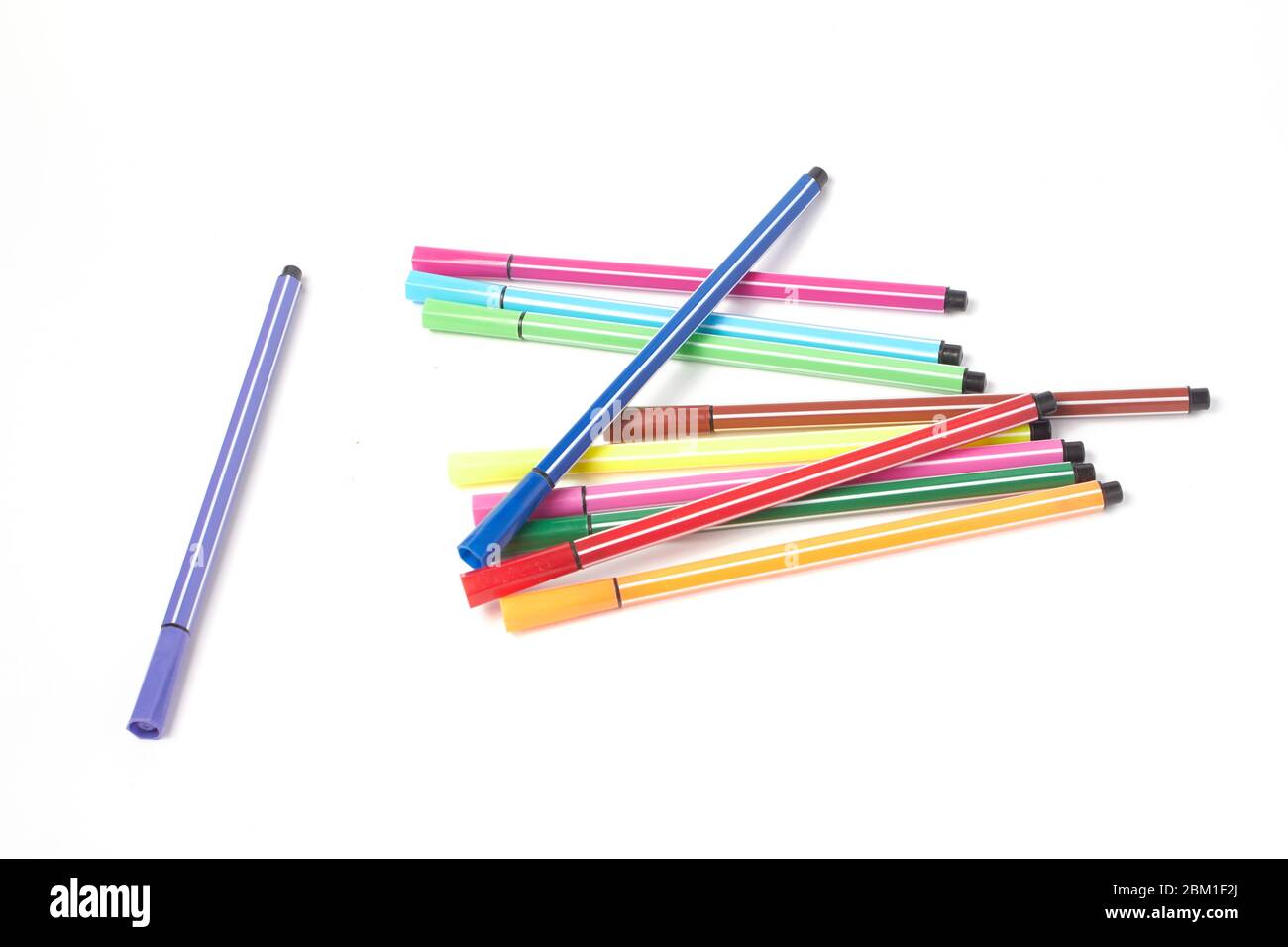 Multi-colored pens, markers on a white background isolate Stock Photo