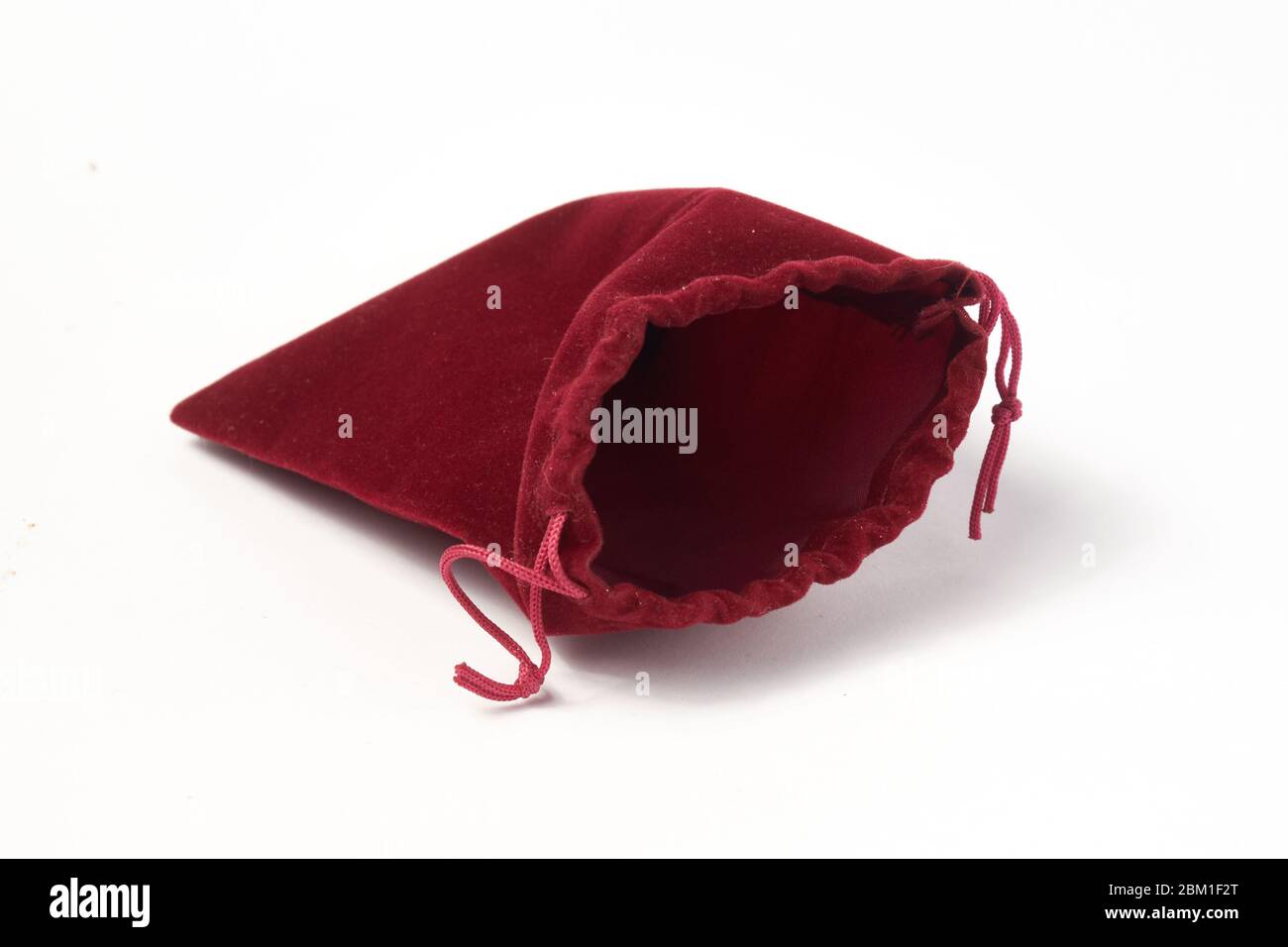 burgundy velor jewelry pouch on a white background isolate Stock Photo