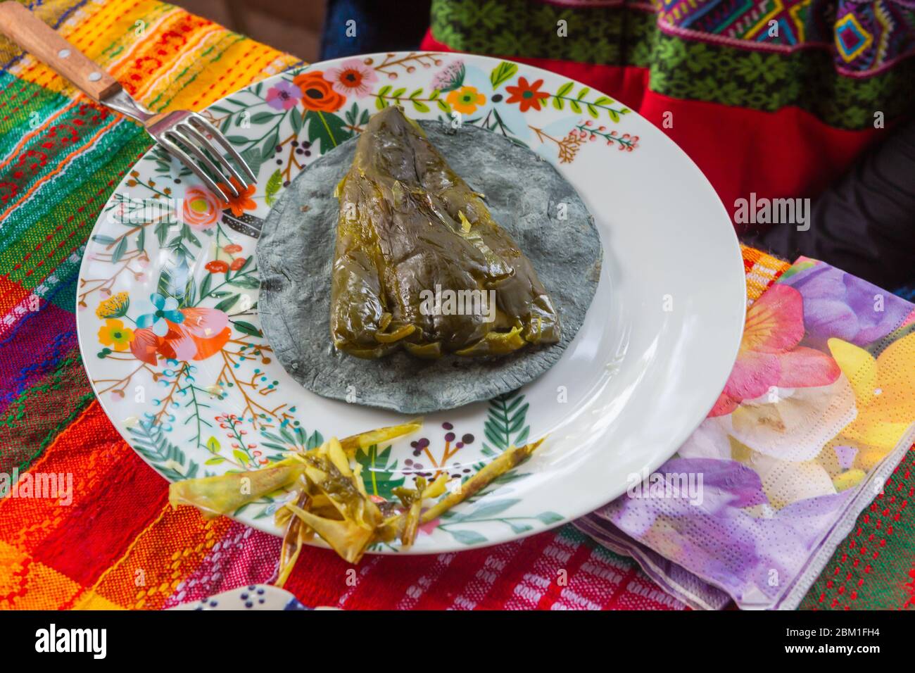 Traditional dish in local restaurant, chile relleno, stuffed poblano pepper, Cuernavac, Morelos, Mexico Stock Photo