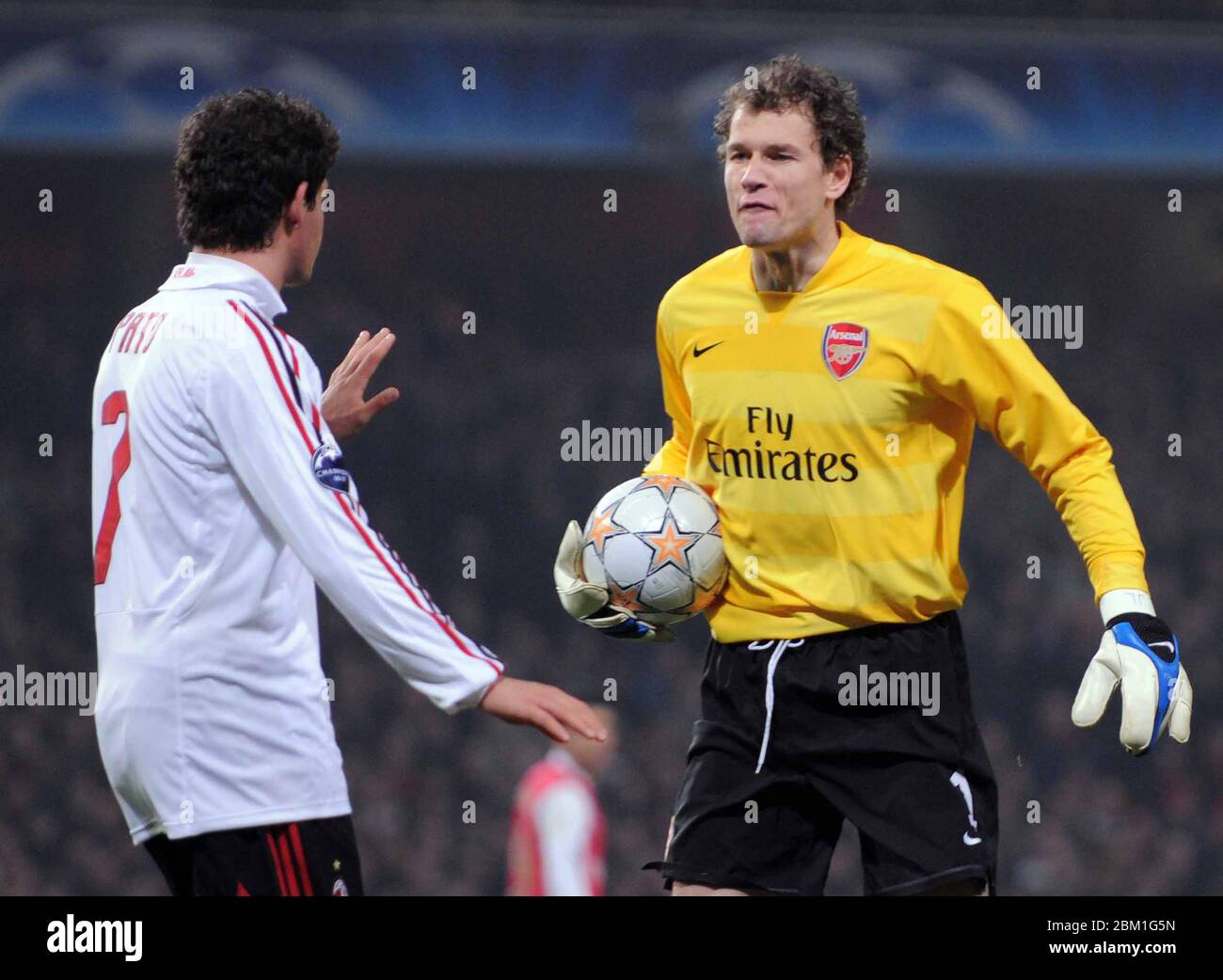 LONDON, UK FEBRUARY 20: JENS LEHMANN of Arsenal have words with PETO of AC Milan During UEFA Champion League last 16 1st Leg between Arsenal and AC Mi Stock Photo
