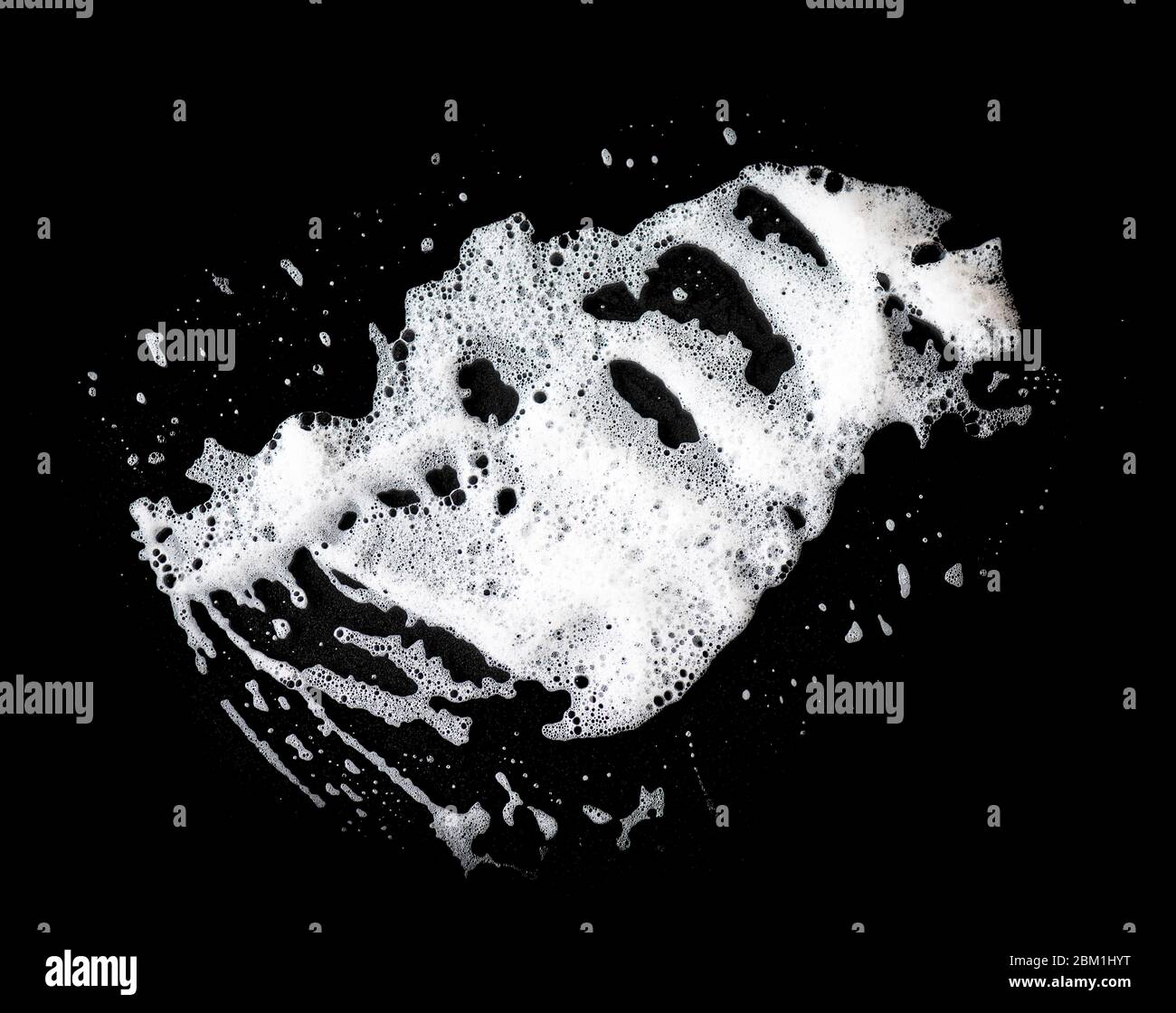 White soap foam on black background, soap bubbles, texture Stock Photo