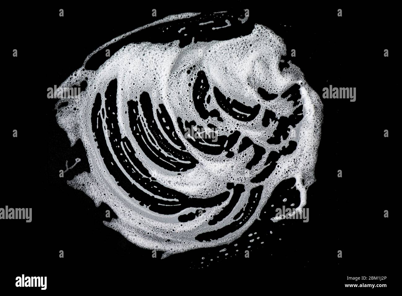White soap foam on black background, soap bubbles, texture Stock Photo