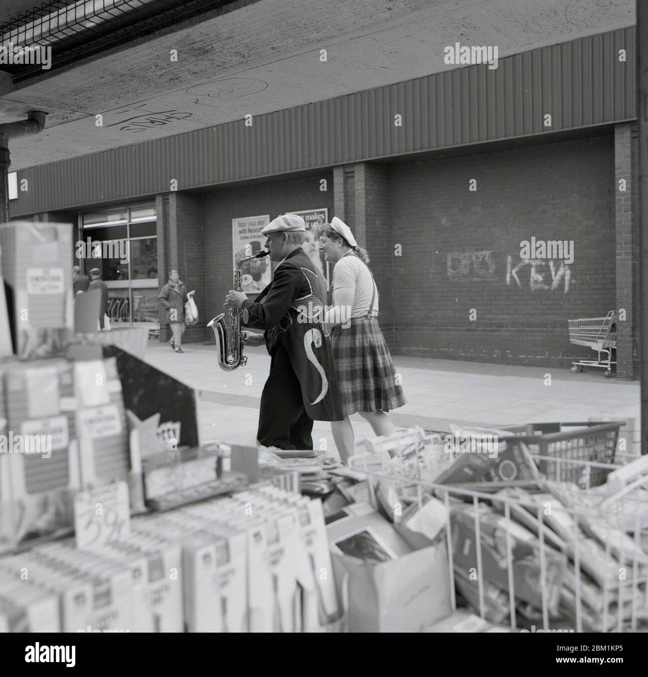Musicians busking in market, South Elmsall, West Yorshire, Northern