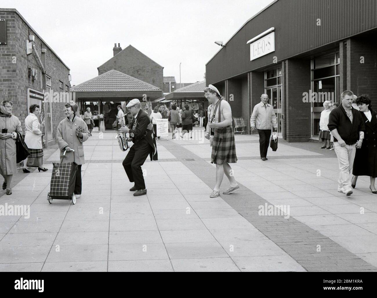 Musicians busking in market, South Elmsall, West Yorshire, Northern