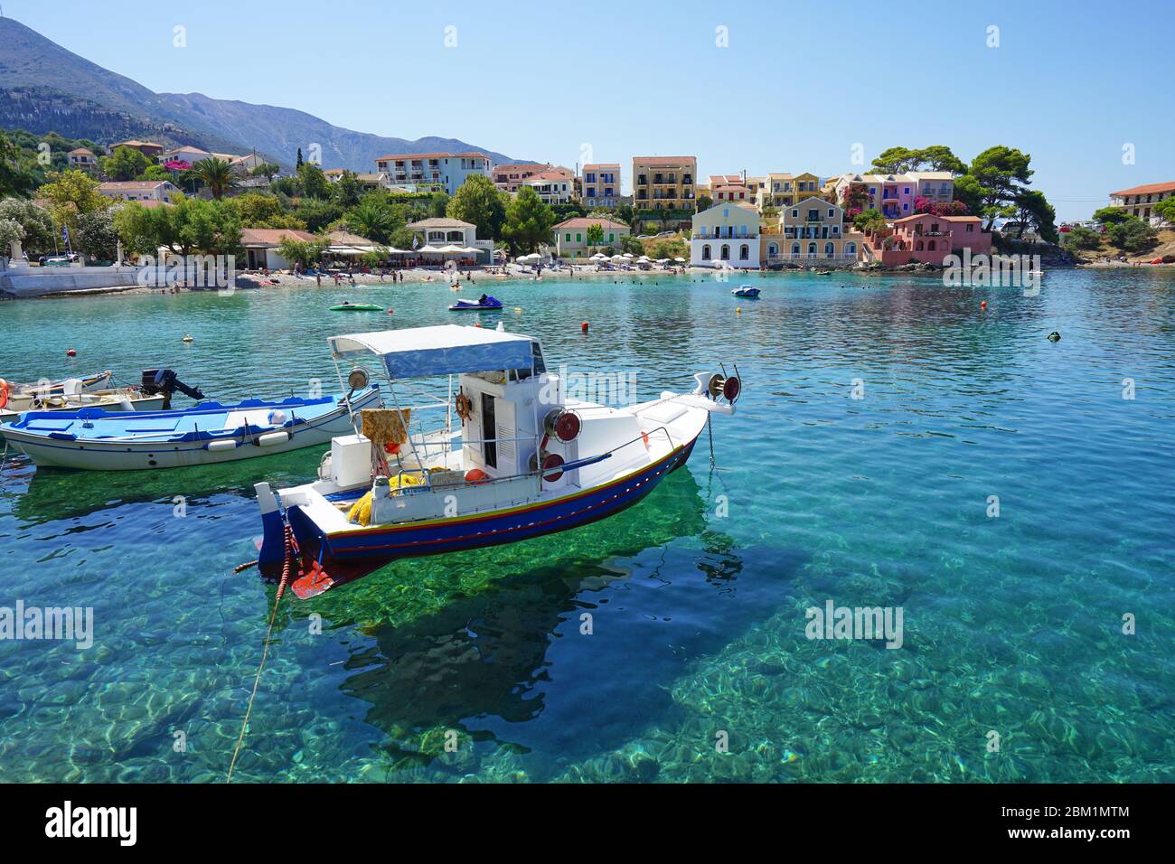 Asos village panorama and blue sea on a sunny day, Kefalonia (Cephalonia) Island, Ionian Sea, Mediterranean, Greece Stock Photo