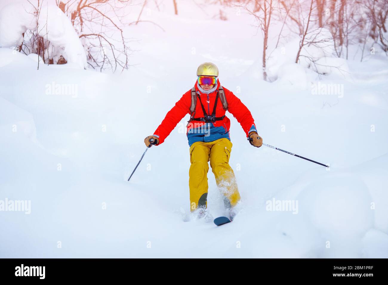 down mountain on skis Stock Photo 