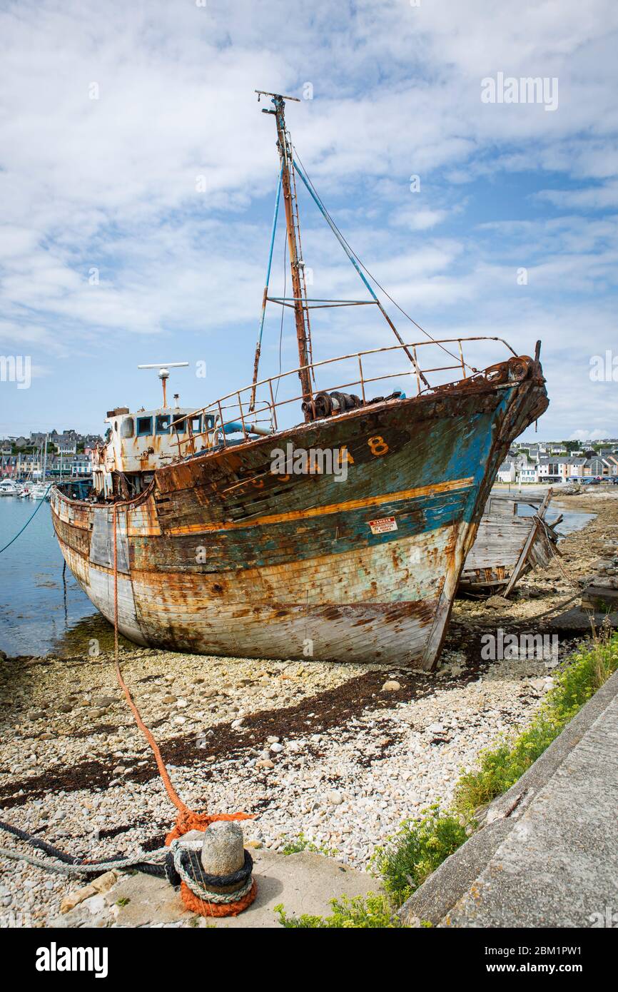 Old ship at the ship cemetery at Camaret-sur-Mer, France. Stock Photo
