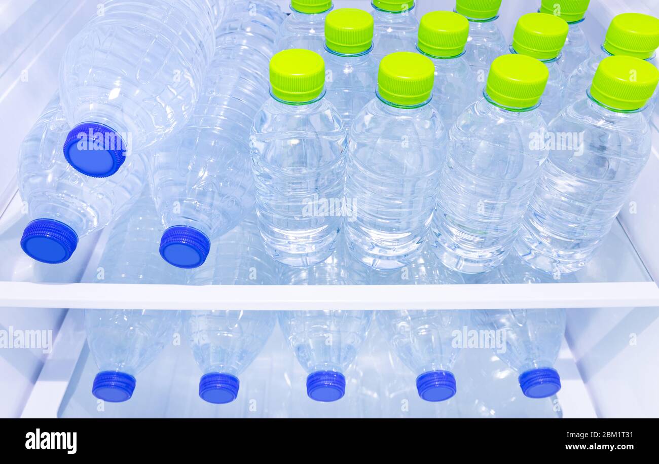 Bottle Of Water In Fridge. Stock Photo, Picture and Royalty Free Image.  Image 70211863.