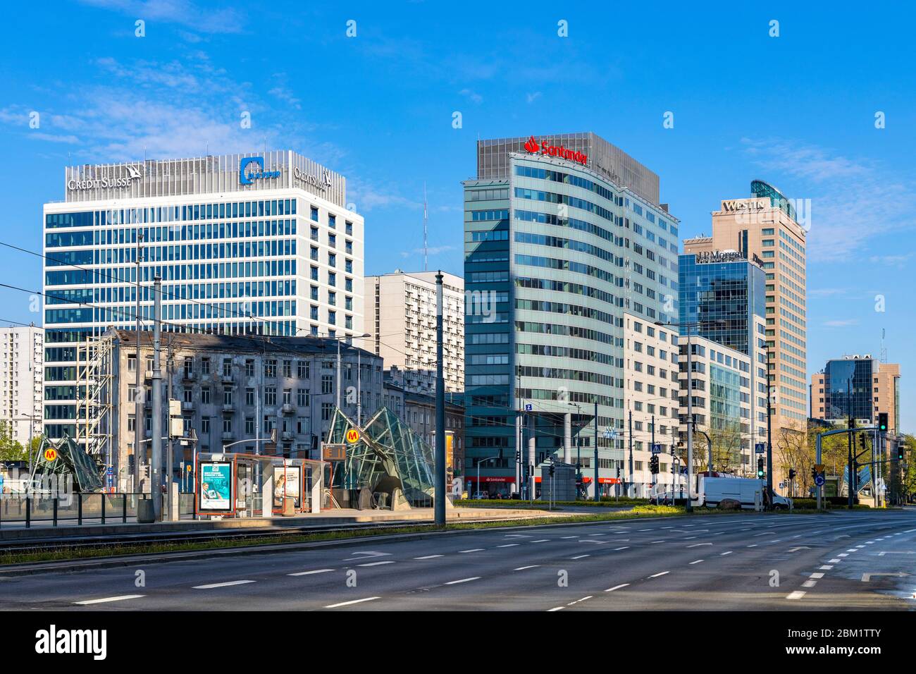 Warsaw, Mazovia / Poland - 2020/05/02: Panoramic view of Srodmiescie downtown district with Rondo ONZ roundabout and surrounding office buildings alon Stock Photo