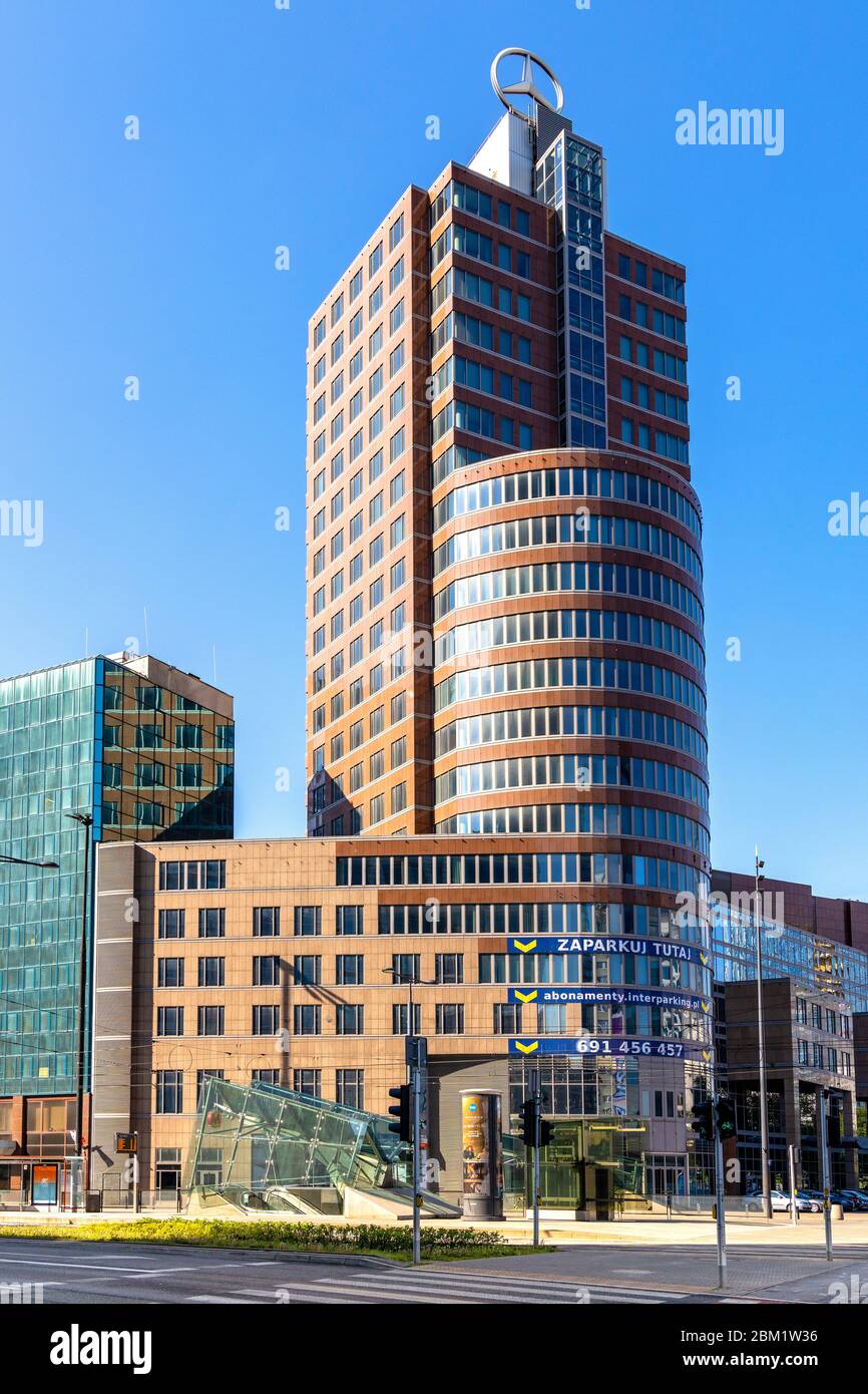 Warsaw, Mazovia / Poland - 2020/05/02: Ilmet office building at Rondo ONZ roundabout and Metro station in Srodmiescie city center business district of Stock Photo