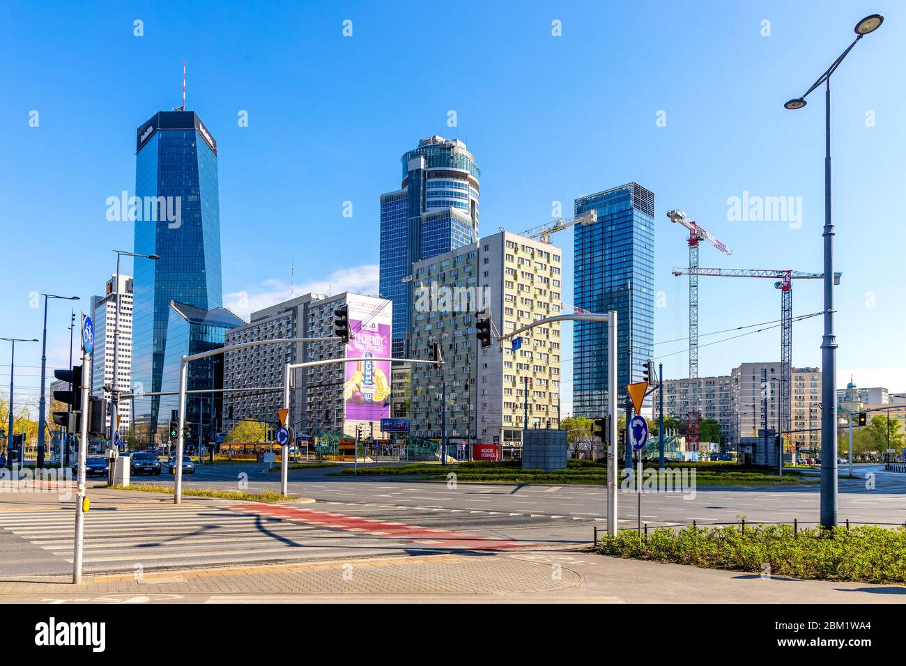 Warsaw, Mazovia / Poland - 2020/05/02: Panoramic view of Srodmiescie downtown district of Warsaw at Rondo ONZ roundabout with Q22, Cosmopolitan and Sp Stock Photo