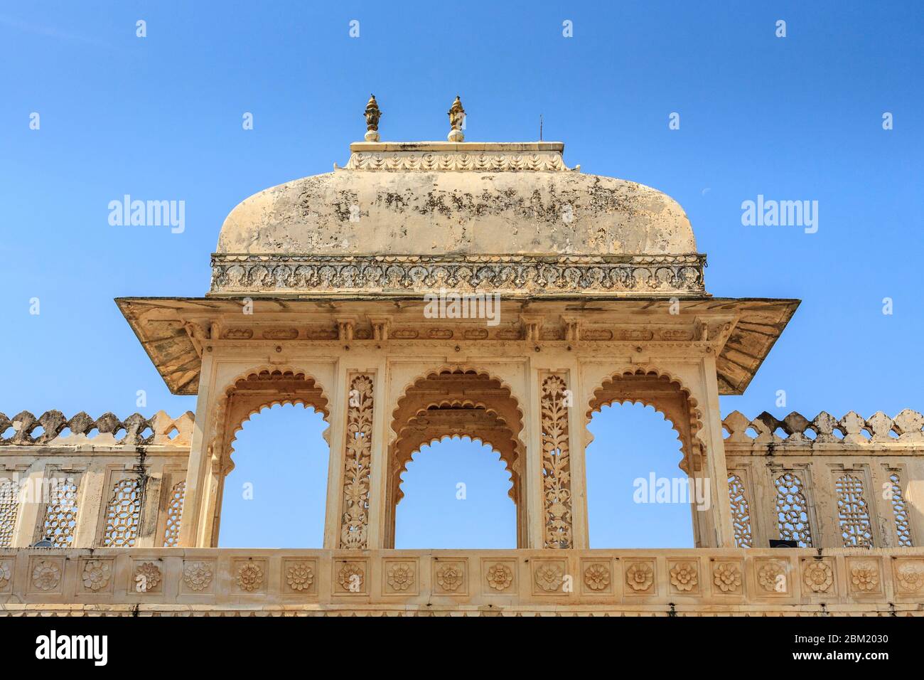Mughal architecture of one of the decorated balconies of the City Palace at Udaipur, India Stock Photo