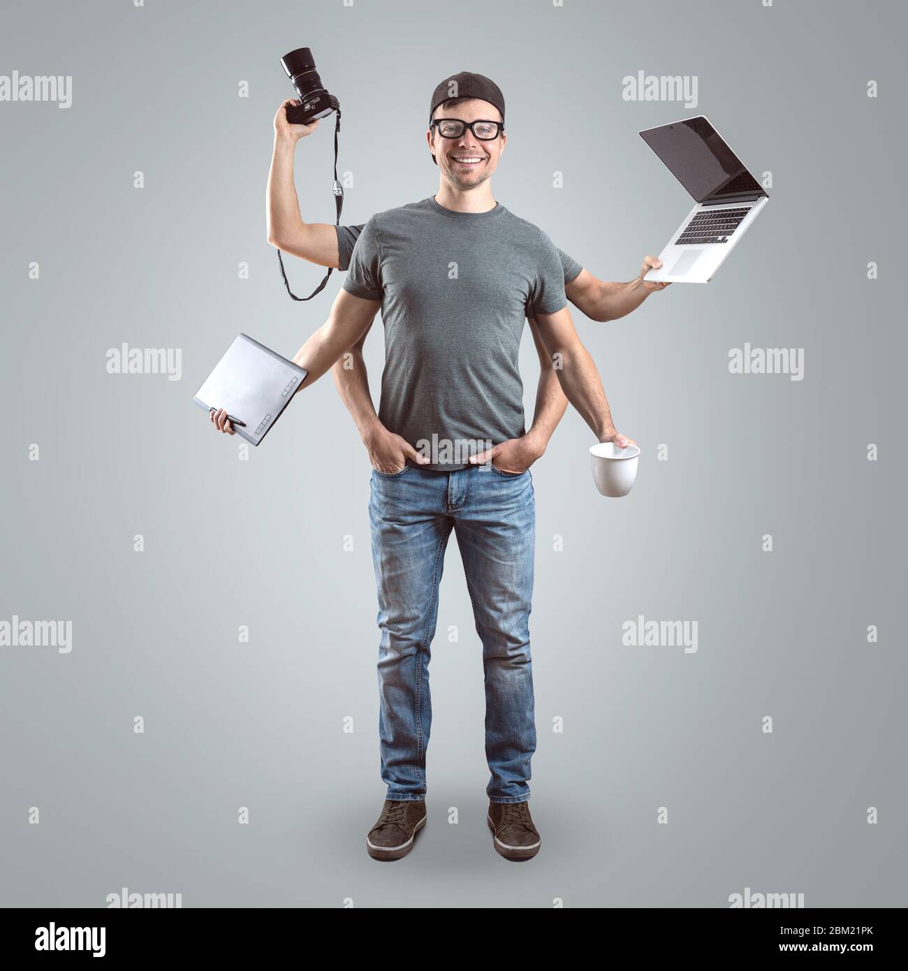 Funny designer with multiple arms Stock Photo