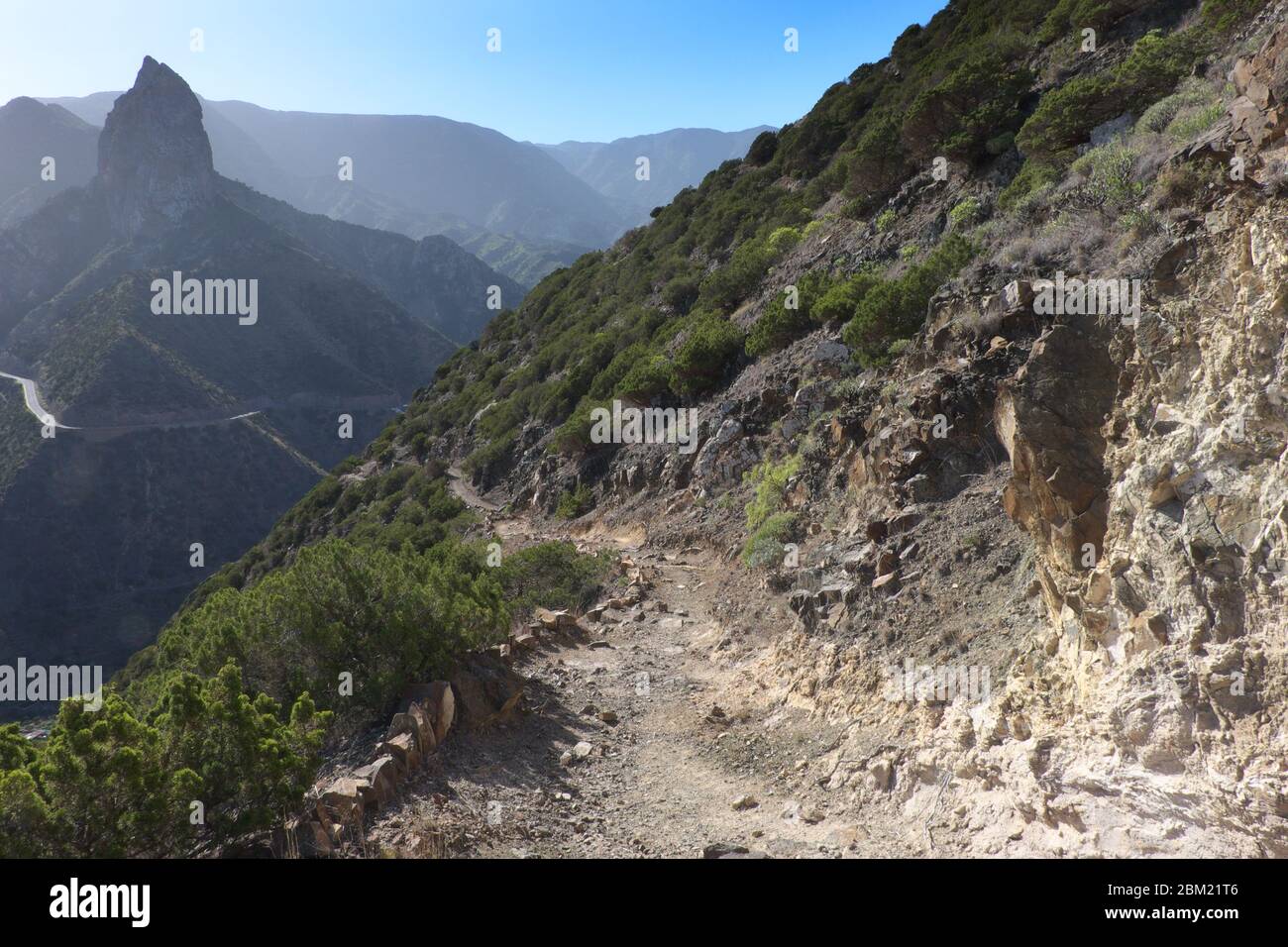 Roque El Cano and volcanic landscape seen from Vallehermoso path on La Gomera, one of the smaller Canary Islands Stock Photo