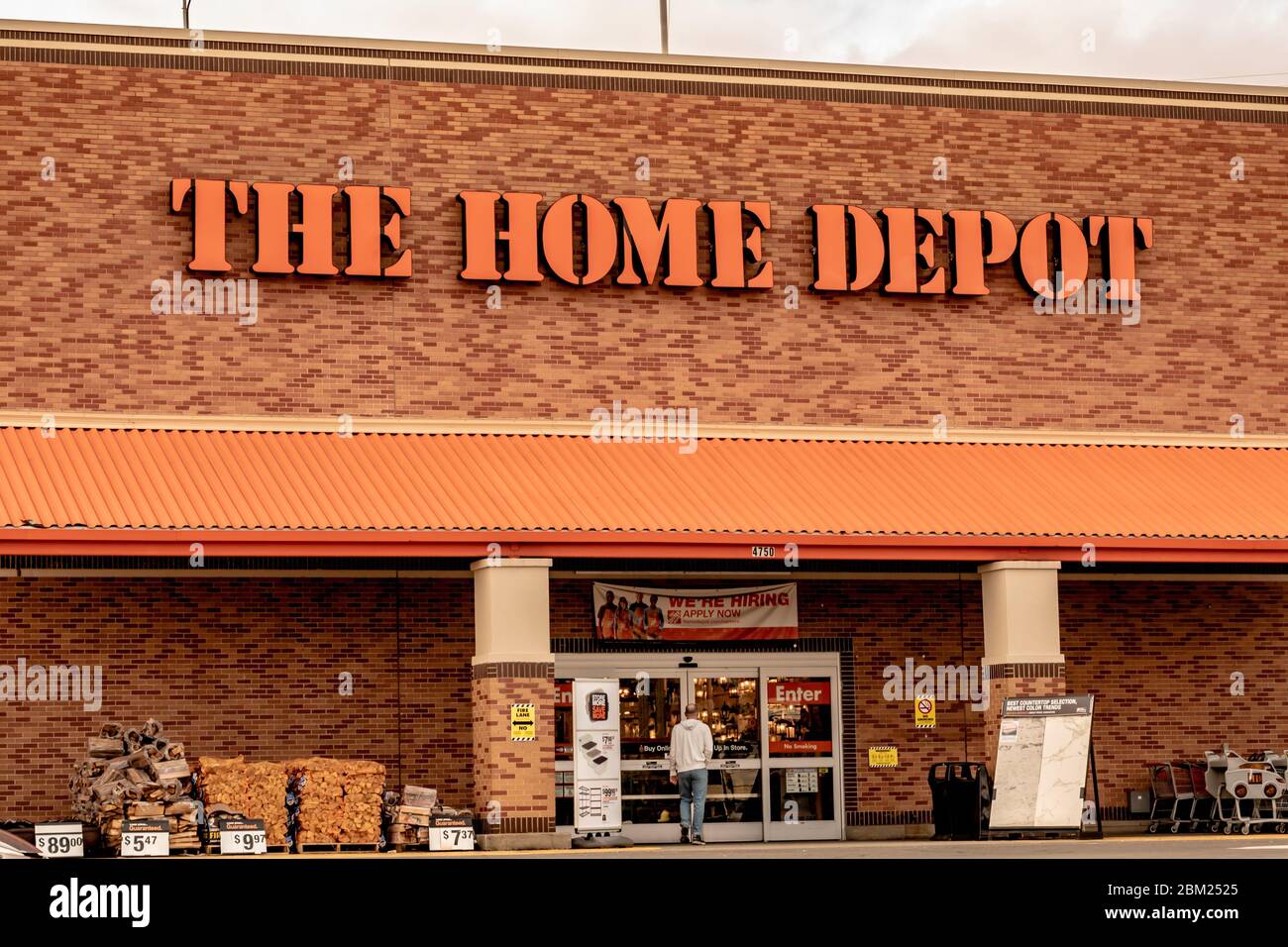 Charlotte, NC/USA - January 15, 2020: Horizontal medium closeup of facade of 'The Home Depot' showing brand in orange letters above entrance. Stock Photo